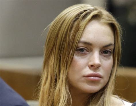lindsay lohan mean girls star accused of spitting in patron s face