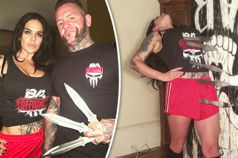 busty performer almost has throat slit by knife throwing husband daily star