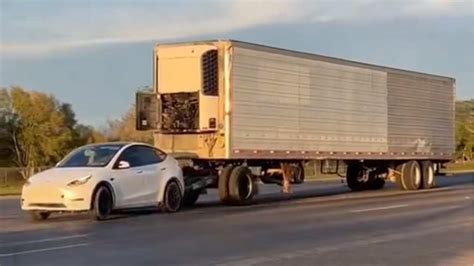 tesla model   towing semi trailer    rated towing