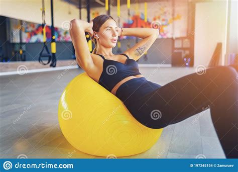 Woman Doing Abdominal Crunches Pilates Exercise On Exercise Fitness