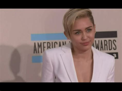 miley cyrus regrets swinging naked in wrecking ball video i m never