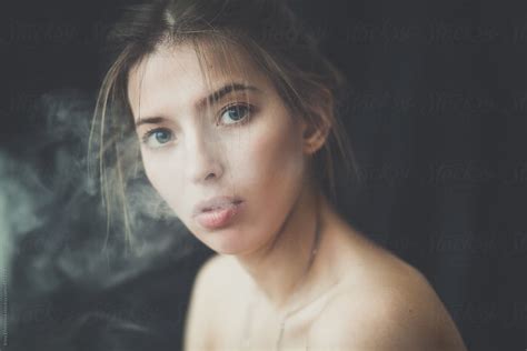 Girl With Smoke By Stocksy Contributor Irina Efremova Stocksy
