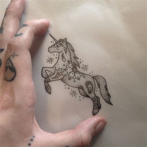 unicorn tattoo by medusa lou tattoo artist medusaloux