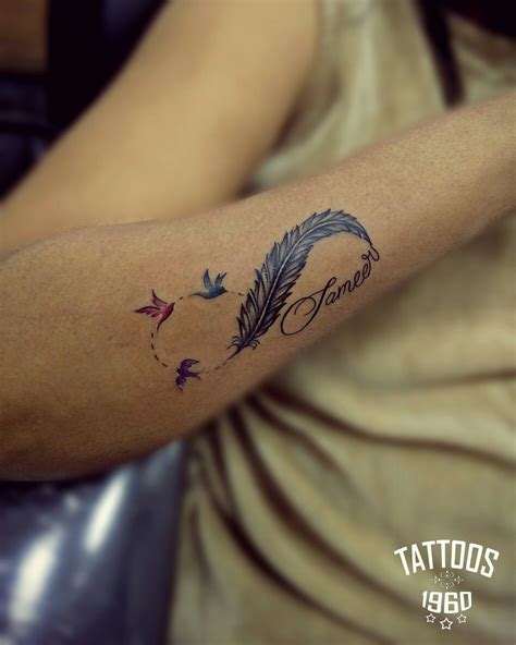 Colored Feather With Birds Tattoo