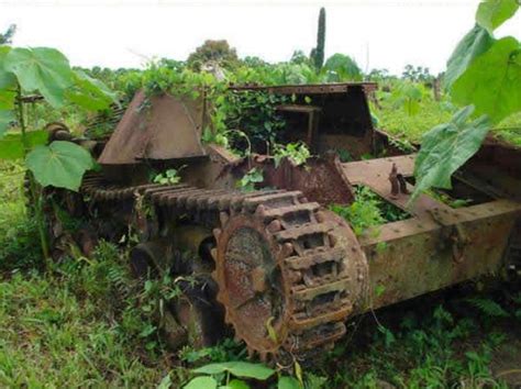 photos of old warrior tanks at rest in abandoned green