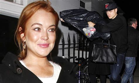 lindsay lohan hides inside a garbage bag after a long night of clubbing daily mail online