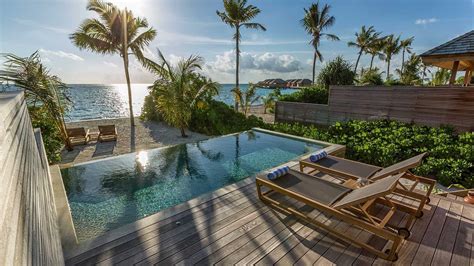 beach sunset pool villa hurawalhi maldives resort villas maldives