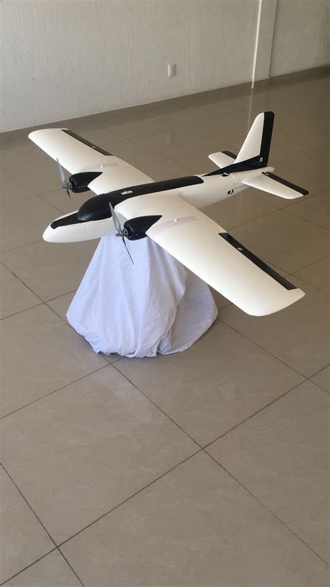 longest distance range drone   carry minimum  kg payload  long