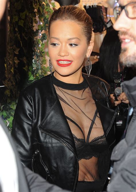 rita ora flashes her sexy lace bra as she sizzles at