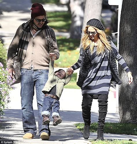 rachel zoe swings her son for the paps and he falls over