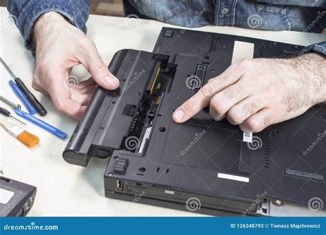 laptop service removal   battery   service technician stock image image  battery
