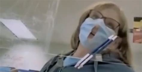 Video Shows Woman Cut A Hole In Her Face Mask To Make It