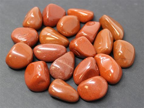 red jasper tumbled stones choose   pieces  grade red