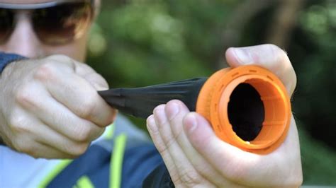 a collapsible rubber cone lets this tiny slingshot hide in