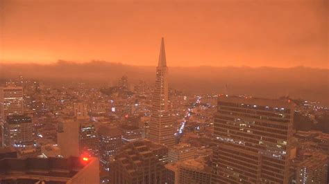 show san francisco skies turn orange  wildfires rage
