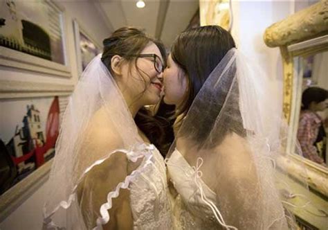 chinese lesbian couple defies law and got married india tv