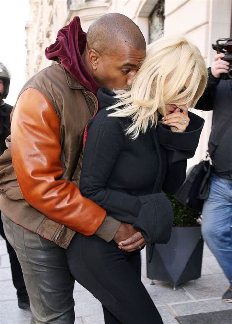kanye west can t keep his hands off newly blonde kim as