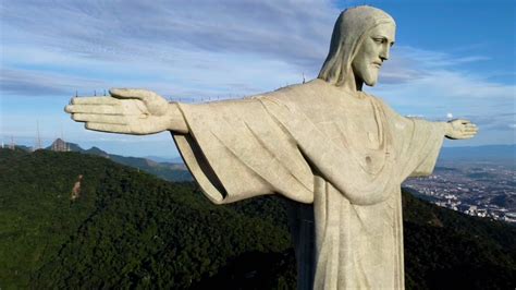 open arms blessing  city    story   majestic christ  redeemer  rio de