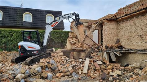 job story bobcat excavator  loader demolish  house