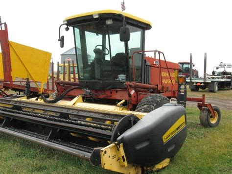 holland hw windrower  propelled  sale sod buster