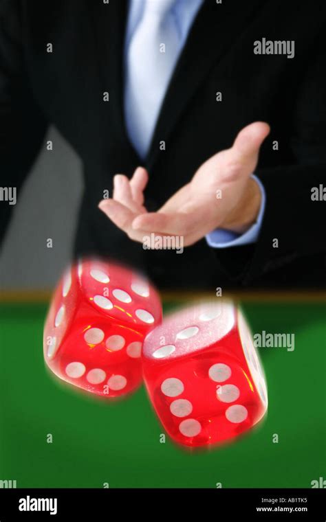man throwing dice stock photo  alamy