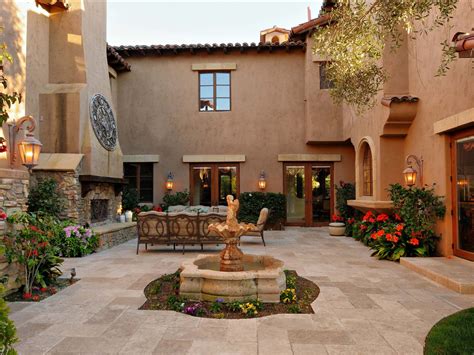 outdoor patio   fountain surrounded  flowers
