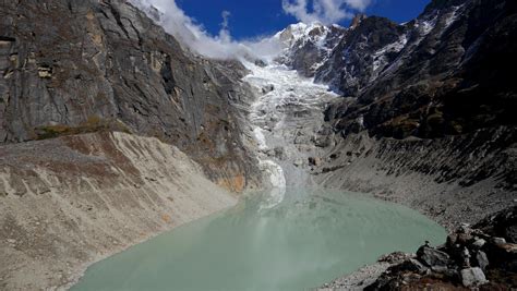 report finds himalayan glaciers  lose   volume  global