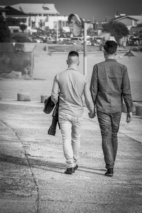 Gay Couple Walking Holding Hands Stock Image Image Of