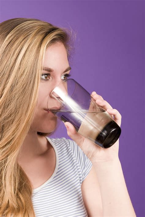 water  stock photo  young woman sipping