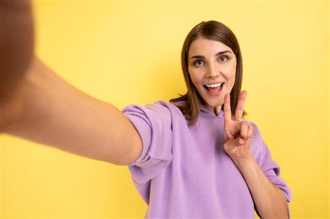 Premium Photo Woman Taking Selfie Looking At Camera Pov Point Of View