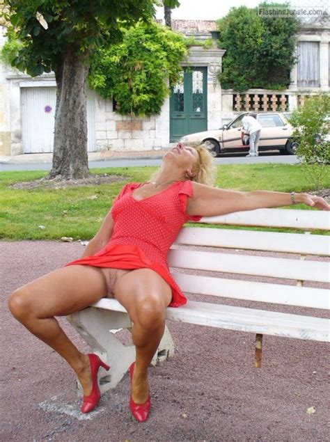 pantyless cougar in red dress and heels on park bench bitch flashing pics mature flashing pics