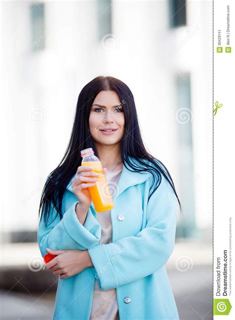 Brunette Holding Bottle Of Juice Stock Image Image Of Juice Brunette