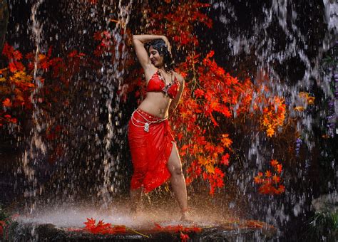anushka shetty mind blowing in waterful hot photos in thigh red bikini