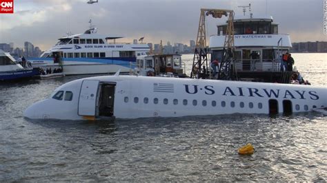 airplane crash lands  hudson river  aboard reported safe