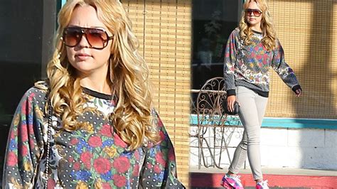 amanda bynes shows blonde curls while shopping in los
