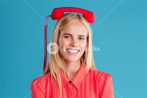 close up portrait of a smiling happy blonde woman with red tube on her