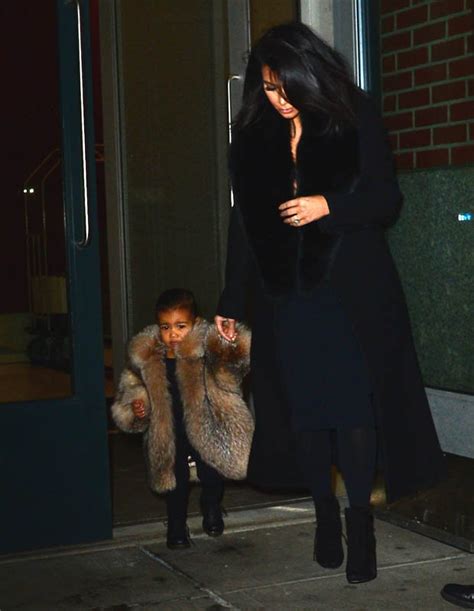 kim kardashian dresses daughter north west in massive fur coat daily star