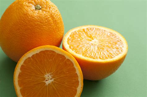 stock photo    halved fresh orange freeimageslive