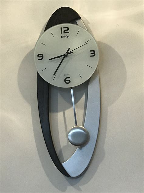 modern wall clock pendulum carved hanging unique oval decorative