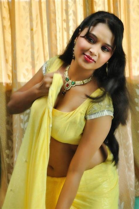 south indian beauty actress in yellow saree hot images she