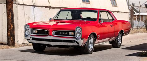 paint  town red   restored  pontiac gto
