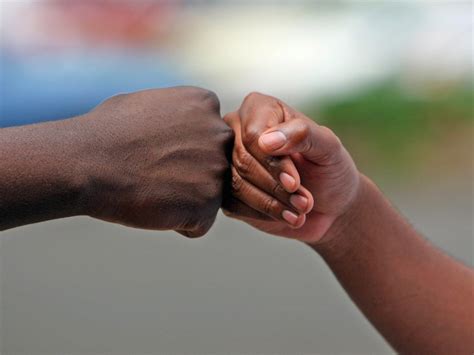 fist bump should replace handshake to avoid spreading disease says mp the independent