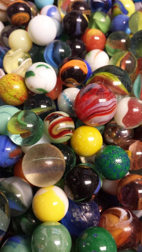 vintage marbles lot of 25 of various designs style and sizes random