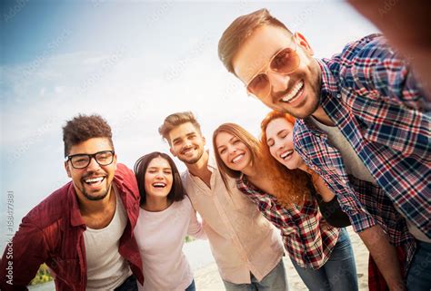 group  young people  fun outdoors   beach stock photo