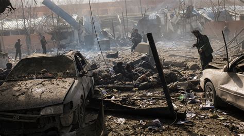 massacre blast  kabul deepens toll   long war