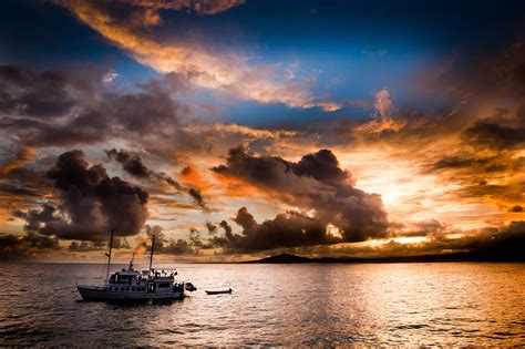 poberezhe yacht sunset evening sea ocean fishing sky clouds reflection boat wallpapers