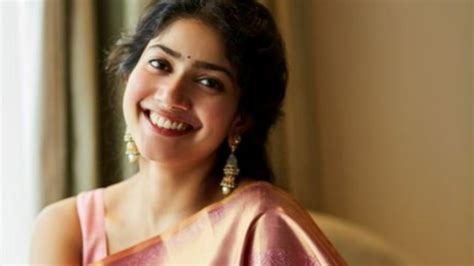Beautiful Smiling Actress Sai Pallavi Is Wearing Light Pink Saree