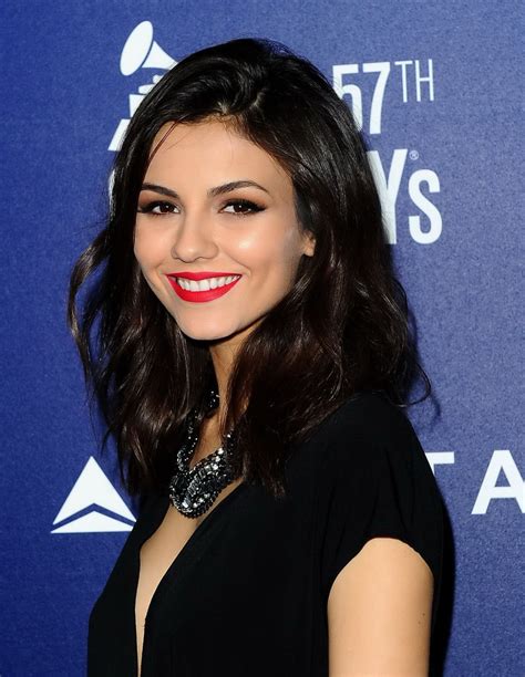 Victoria Justice Showing Big Cleavage In Black Mini Dress