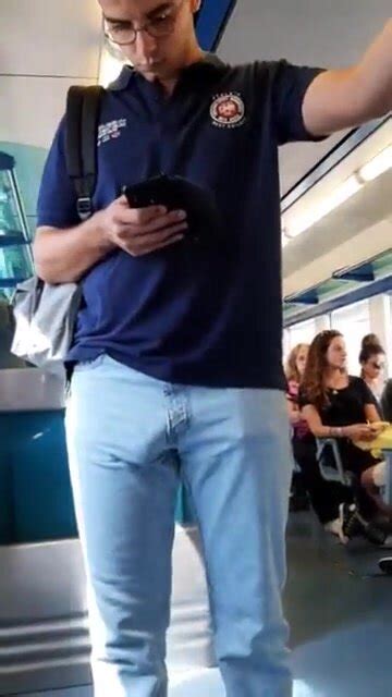 spotted bulge penis outline in jeans on the train