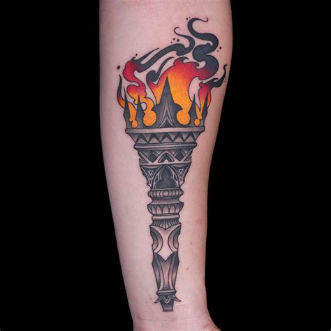 torch tattoo by hiram casas traditional tattoo torch ink master